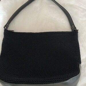The Sak Elliott Luca woven nylon shoulder bag.